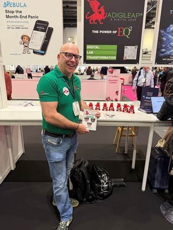 Matt holding flyers in front of Digis at London Lab Live